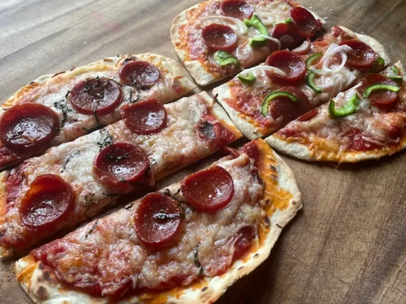 naan pizzas fresh and hot from the oven