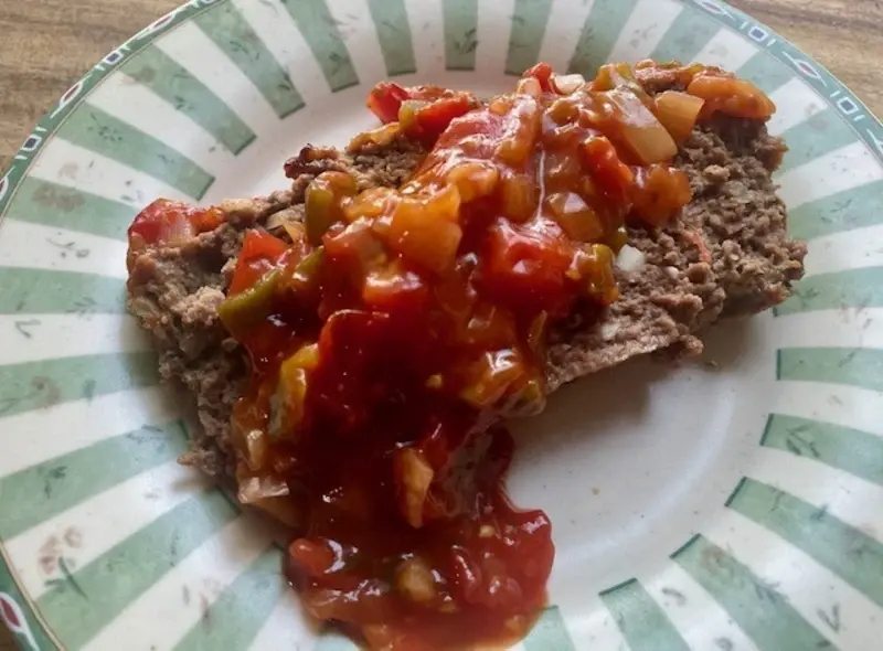 plated venison meatloaf with tomato relish