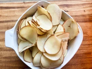 Thinly sliced potatoes for au gratin potatoes
