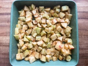 apples seasoned in a baking dish