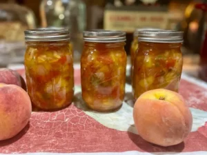 processed jars of Peach salsa with tomatoes