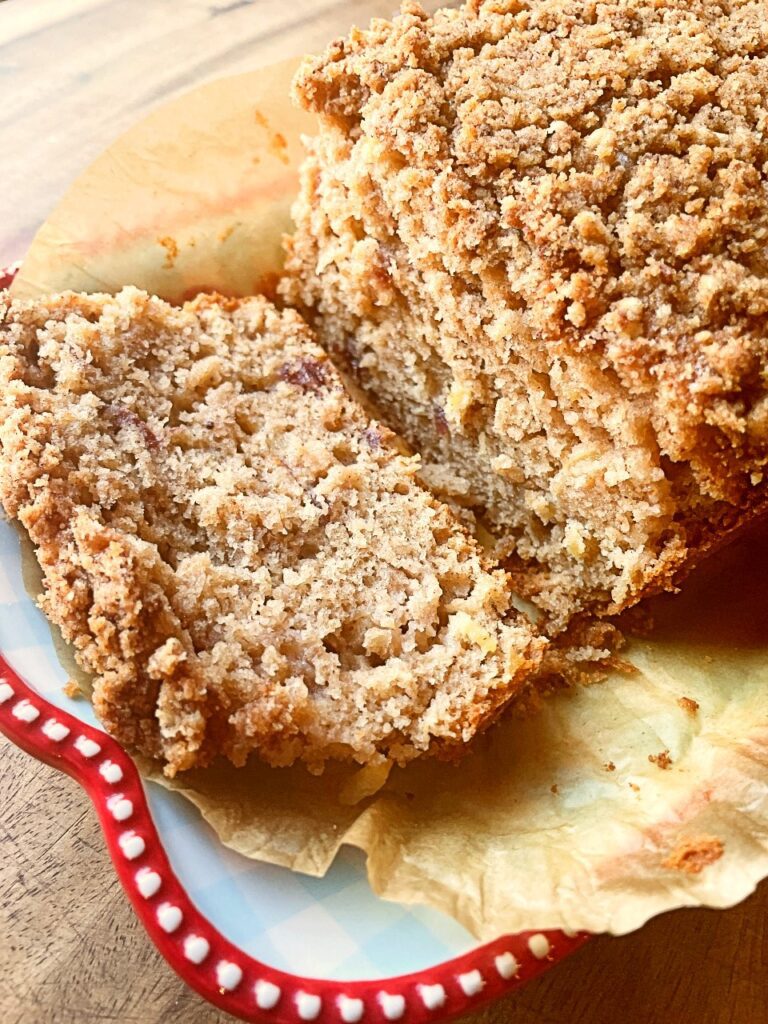 apple cranberry bread sliced on a serving platter