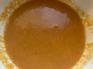 wet ingredients for baked pumpkin donuts with streusel and maple glaze drizzle