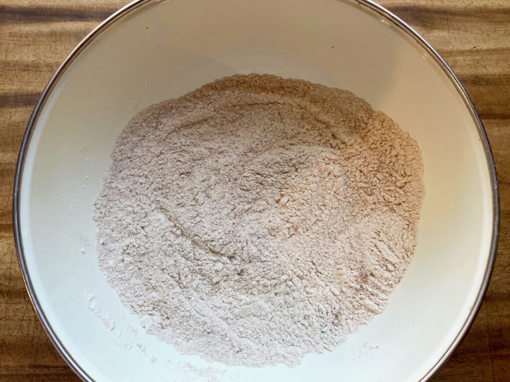 dry ingredients for baked pumpkin donuts with streusel and maple glaze drizzle