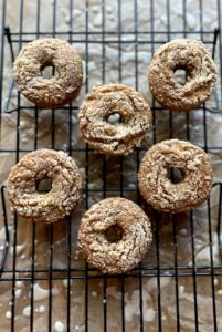 baked pumpkin donuts on cooling rack