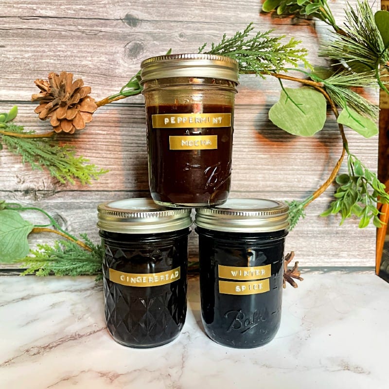Three jars of holiday coffee syrups