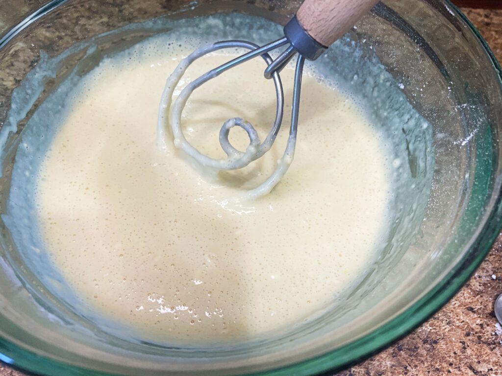 wet ingredients mixed in with the dry ingredients to make pancakes