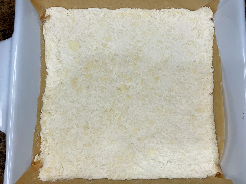 crumbly shortbread mixture pressed into baking dish