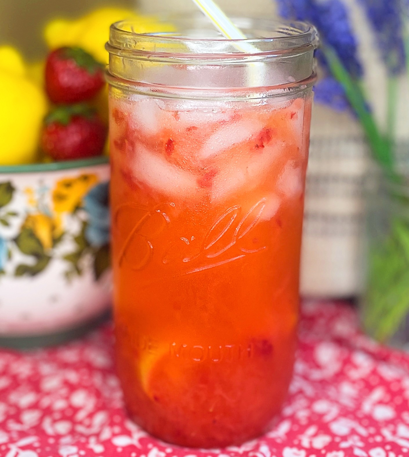 strawberry lemonade in glass with ice