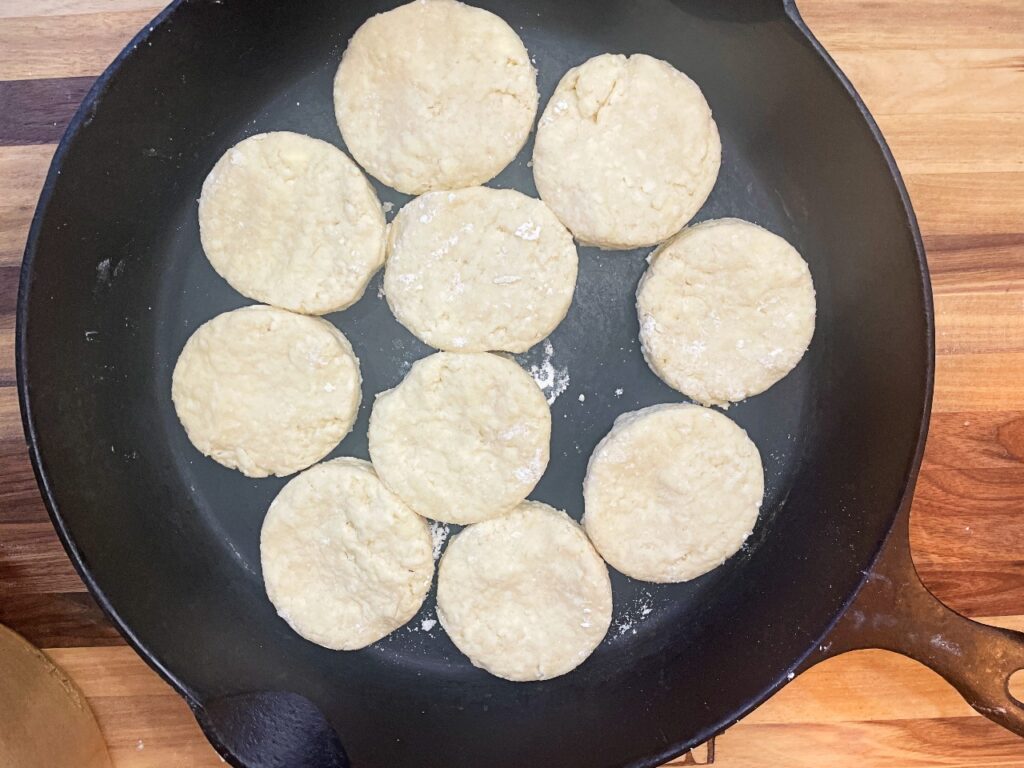 biscuits cut into circled and placed in a cast iron skillet