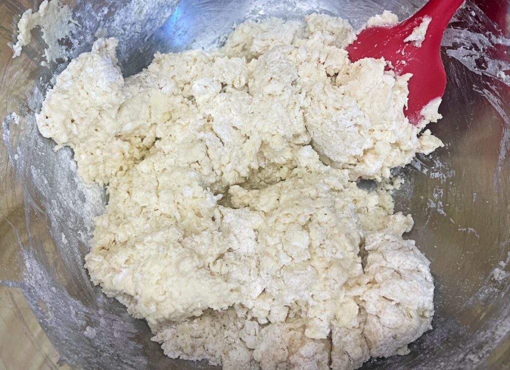 milk added to form biscuit dough for strawberry shortcakes