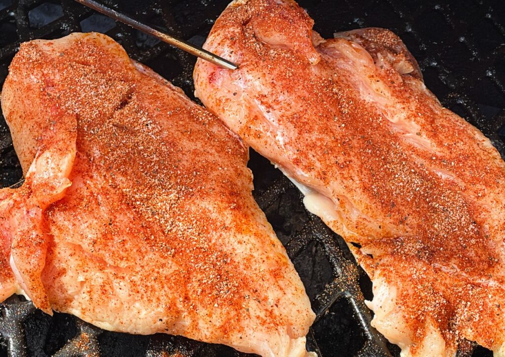 Rub the chicken with oil, lime juice, and the seasoning mixture on the grill