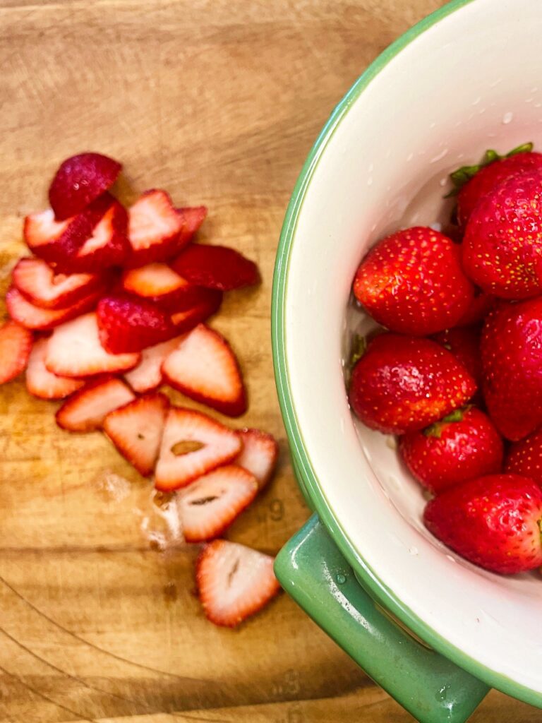 sliced strawberries for layers and for the top of the strawberry icebox cake