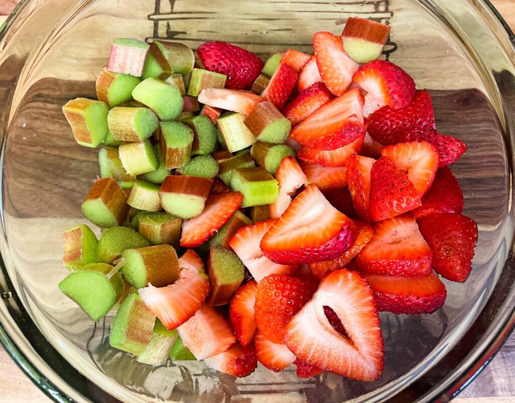 sliced strawberries and rhubarb in a bowl