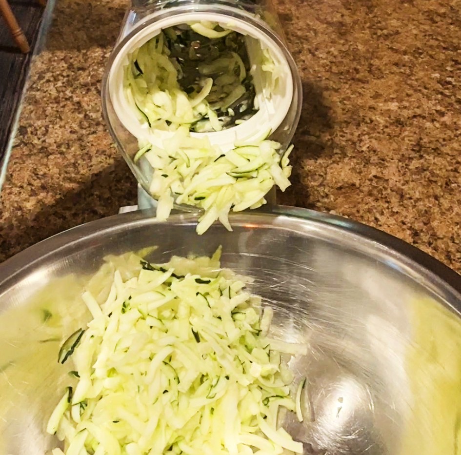 shredded zucchini in a bowl