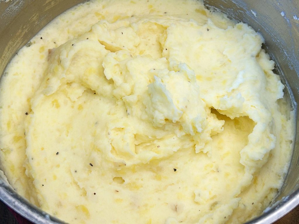 finished creamy mashed potatoes in a pot