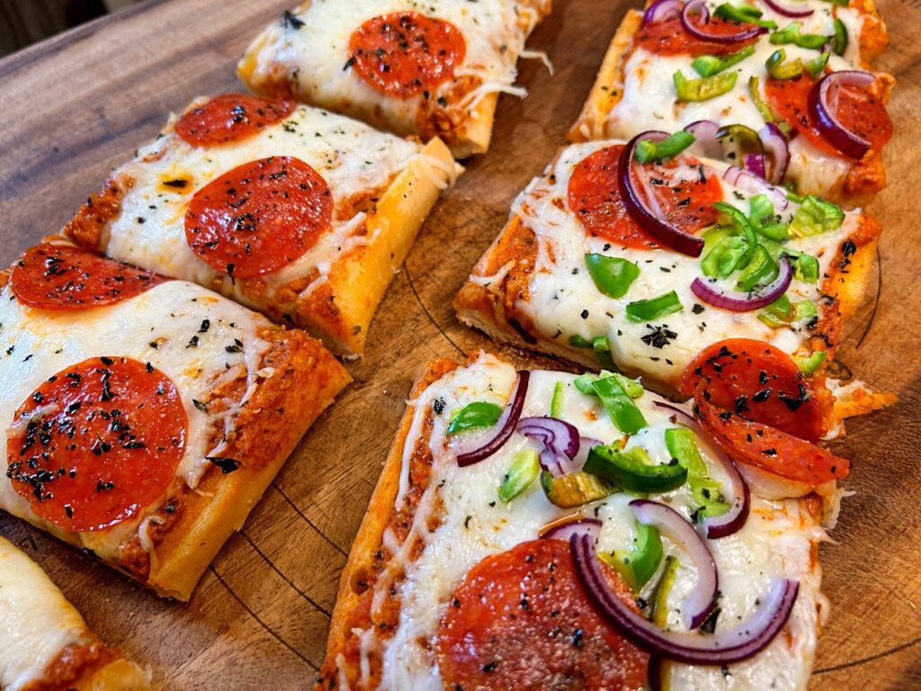 frozen garlic bread pizzas cut into serving portions