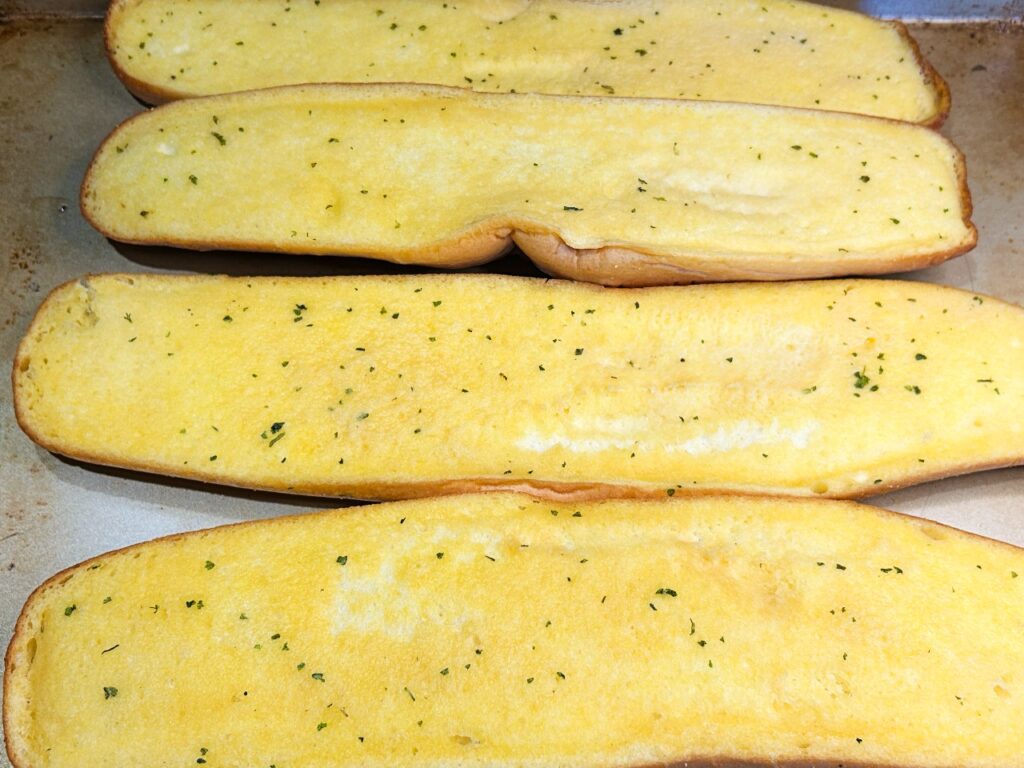 garlic bread pre baked for 5 minutes before adding pizza toppings