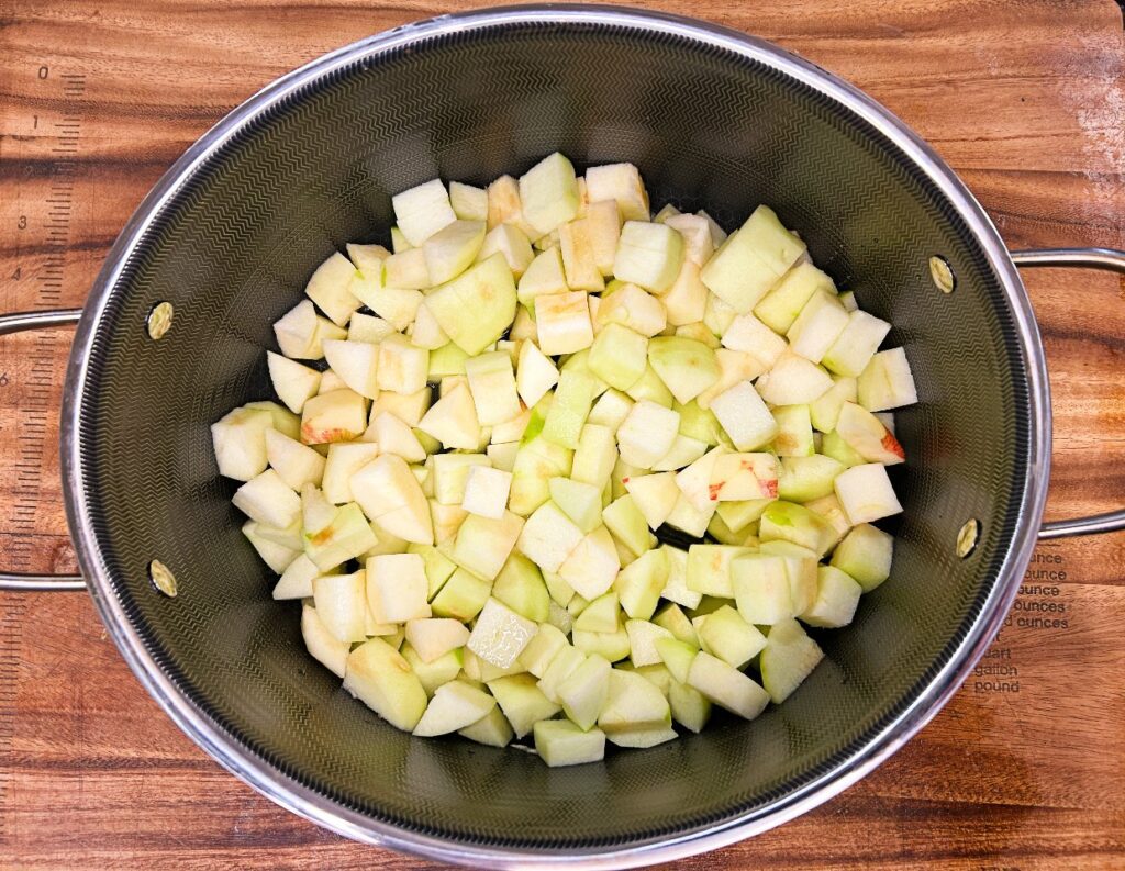 Chopped apples in a Dutch oven before baking