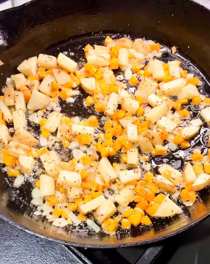 carrots, onions and potatoes sauteing